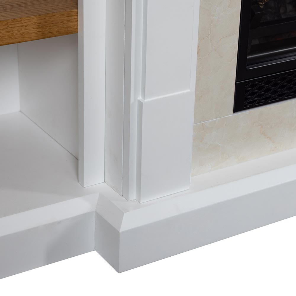 Close-up of the base and decorative trim of the white Belhaven Mantel Bookcase.