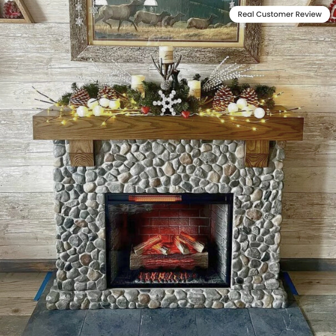 Customer image of close-up of the Glenbrook River Rock Fireplace, demonstrating the authentic farmhouse character developed in partnership with Country Living.