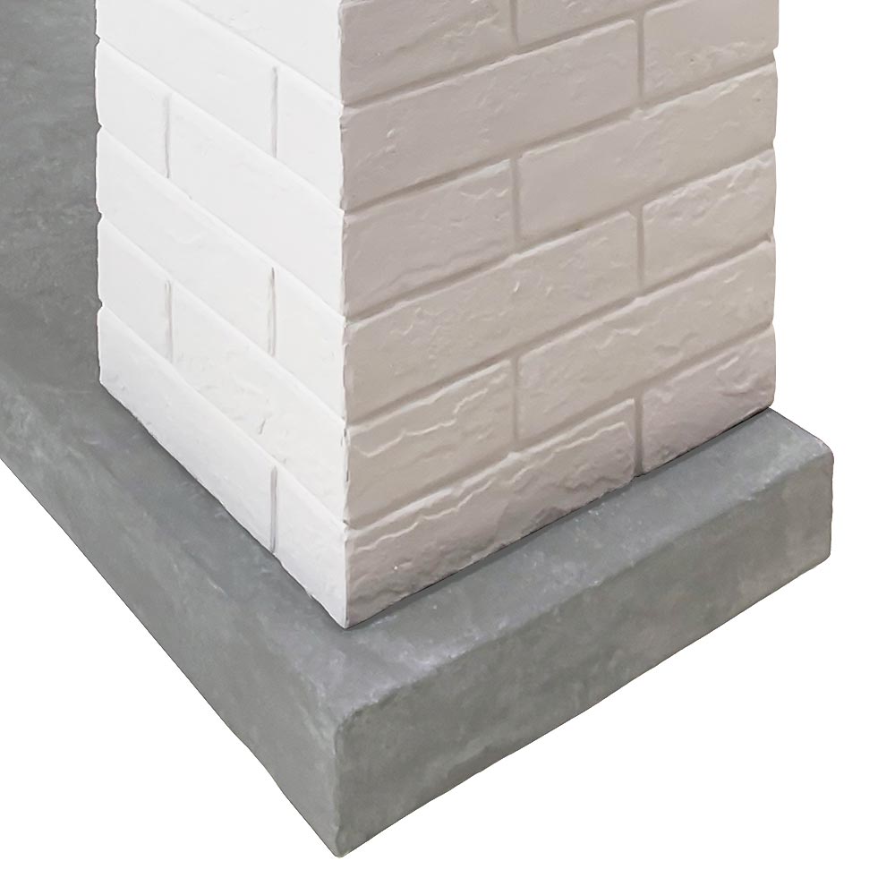 Brick Detail)	Close-up of the white faux brick surround of the Jackson Mantel, highlighting the grout lines and texture.