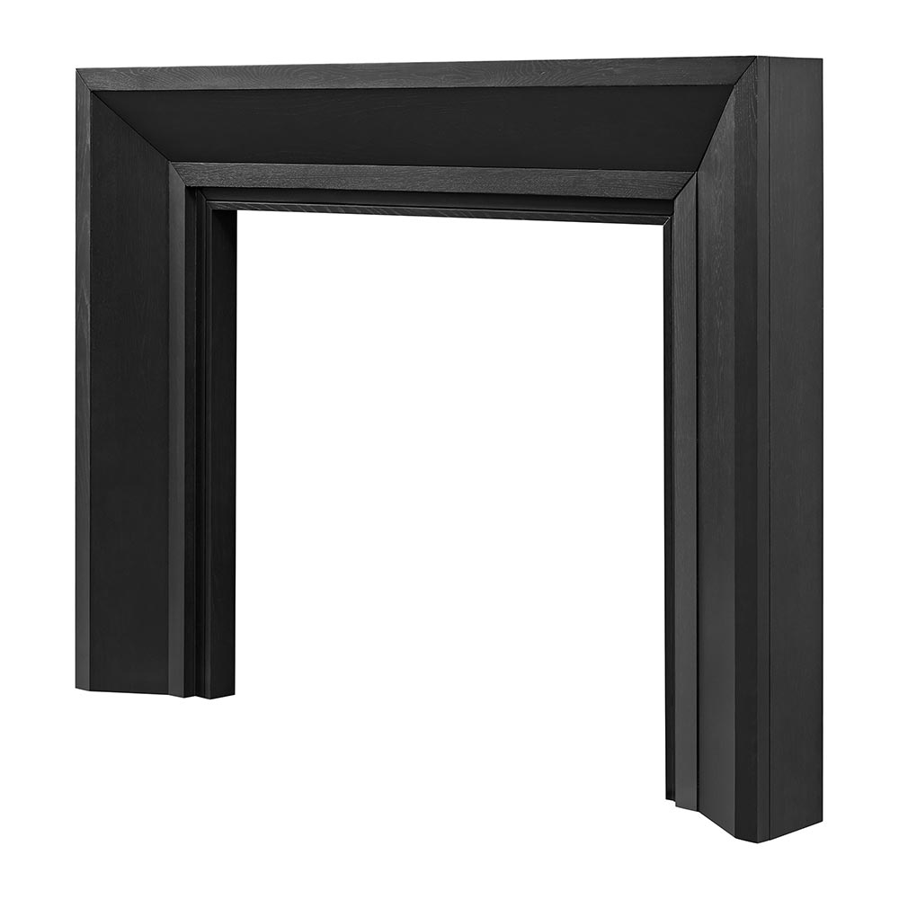 Angled view of the Everly Mantel Surround in matte sable finish, highlighting its depth and sharp edges.