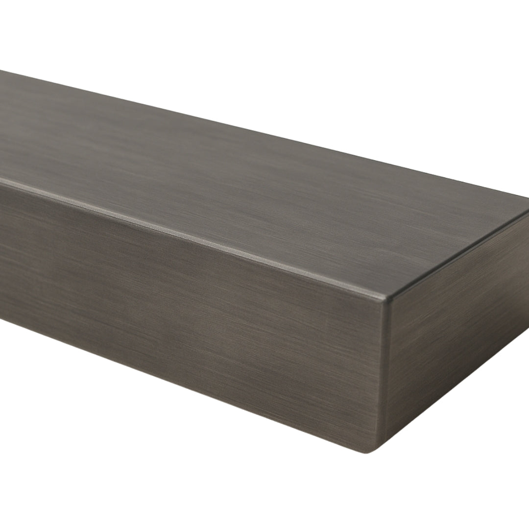 Close up angled view of the Lustra Metal floating shelf in a silver birch finish, emphasizing the clean, minimalist lines and light metallic tone.