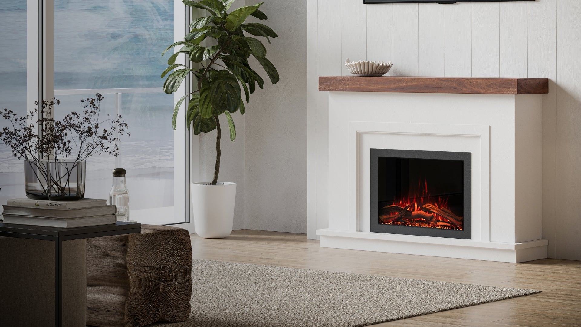 Modern Ember white electric fireplace with black firebox insert and natural wood mantel in coastal living room.
