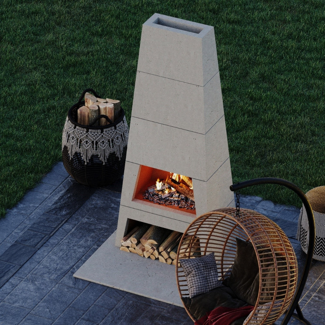 Front down view of the Kairo Outdoor Woodburning Fireplace in the Natural finish, showing the fire burning brightly.