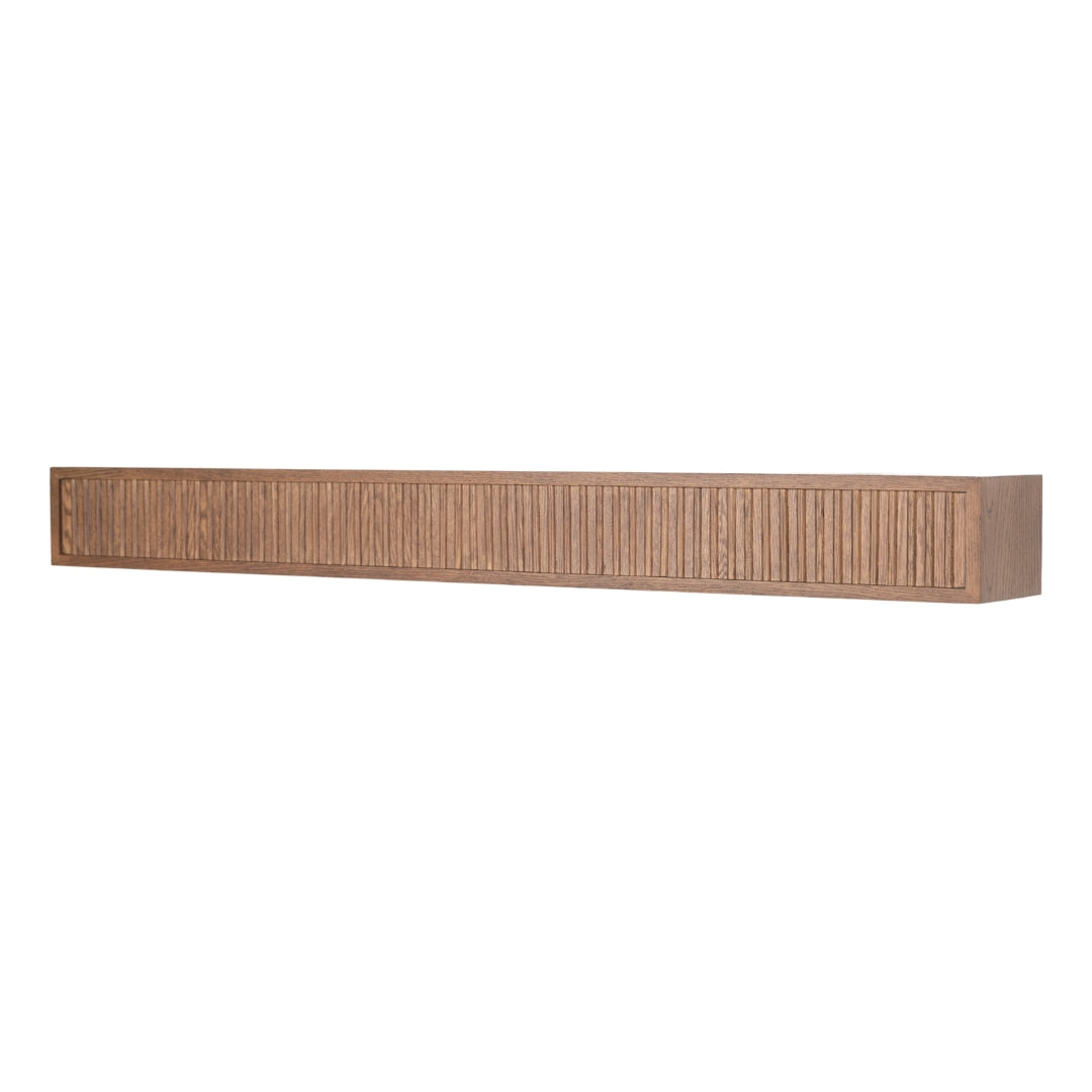 Angled perspective of the Monti Boxframe walnut floating wood shelf, showcasing its substantial depth and distinctive fluted pattern.