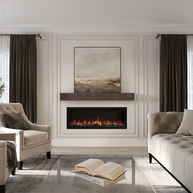 Wide shot of a bright, modern living room featuring the Monti Boxframe Sable finish fluted mantel above a fireplace, with artwork and minimalist decor.