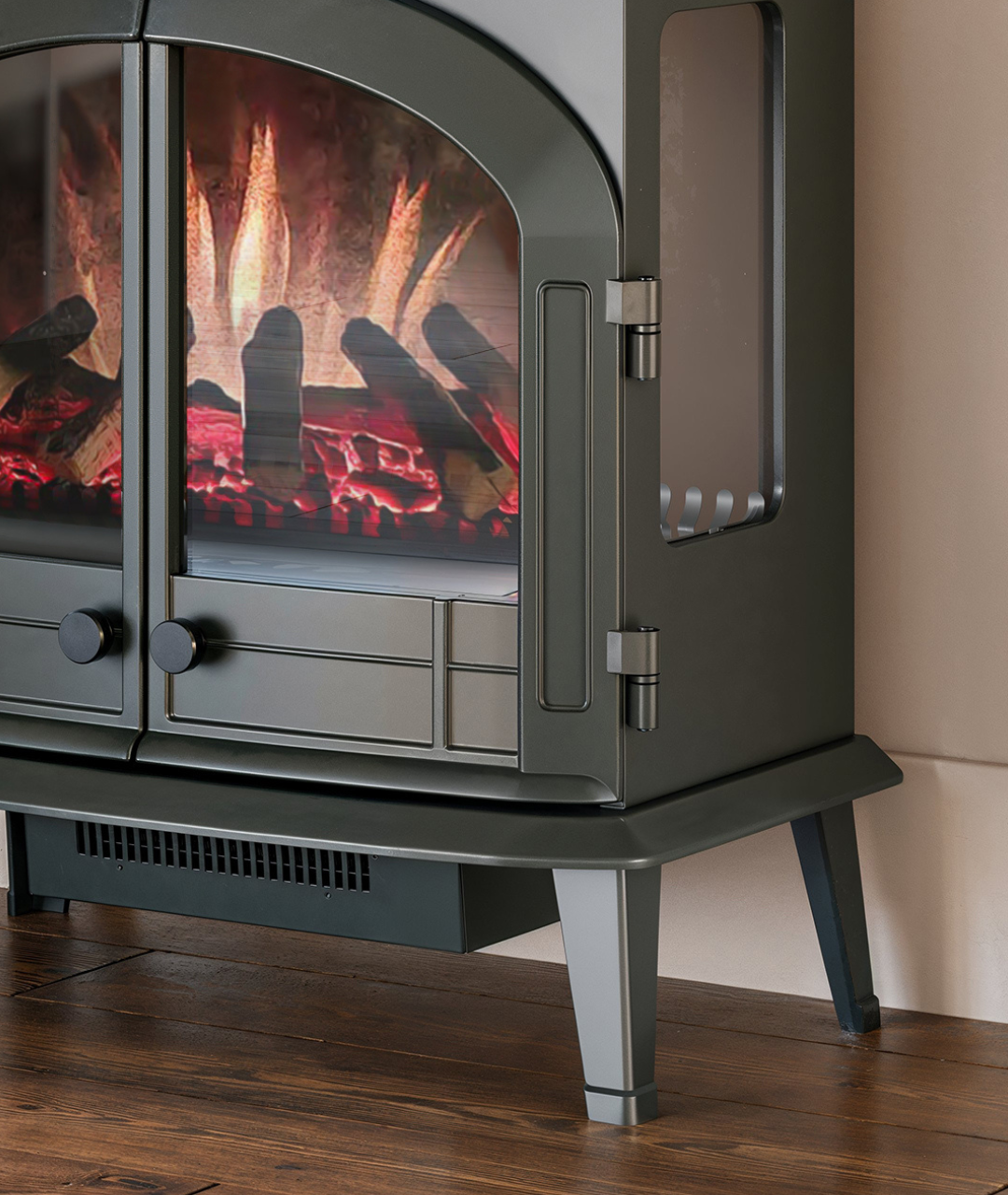 Modern Ember freestanding electric fireplace wood stove with realistic flame and ember bed, classic double-door design, and side viewing windows—perfect for adding cozy charm and efficient heating to any room.