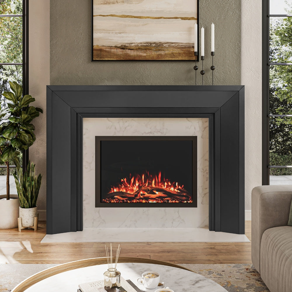 Everly Mantel Surround in black wood finish, installed around an electric fireplace, highlighting its clean lines and modern transitional style.