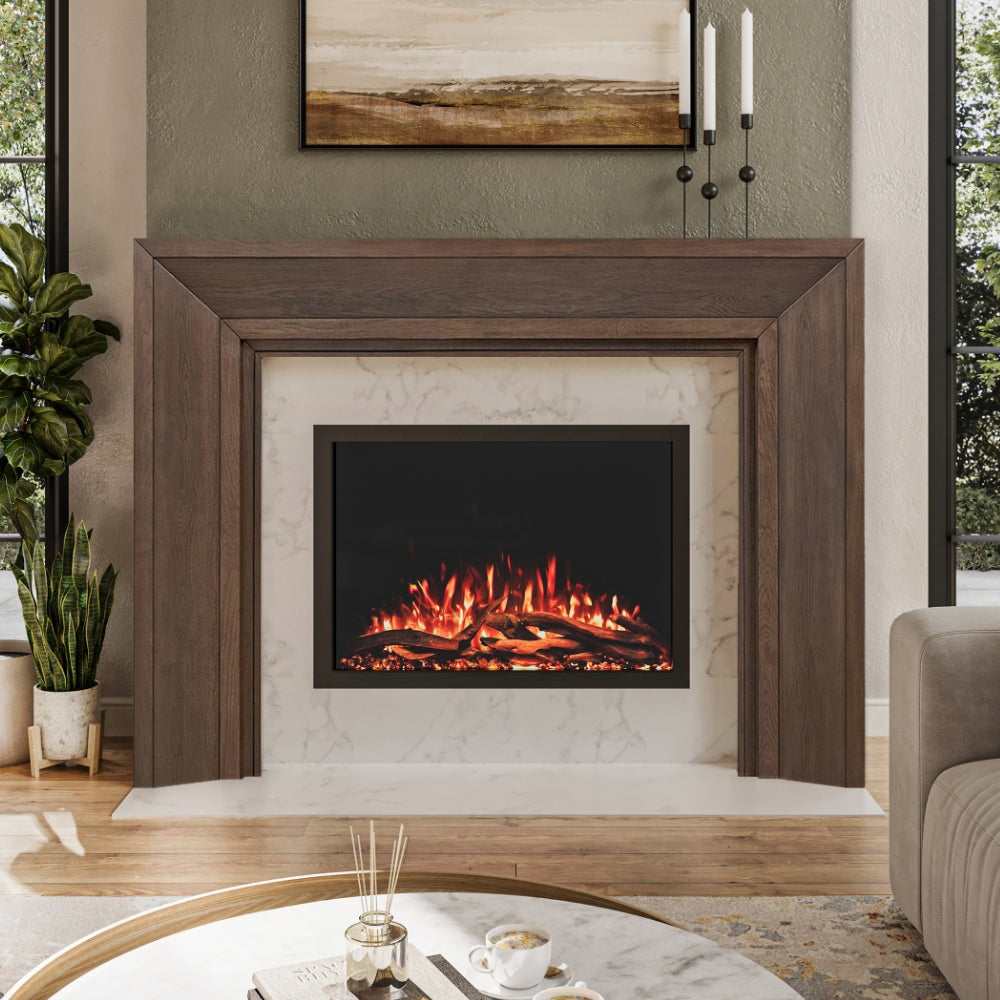 Everly Mantel Surround in deep umber wood finish, installed around an electric fireplace, highlighting its clean lines and modern transitional style.
