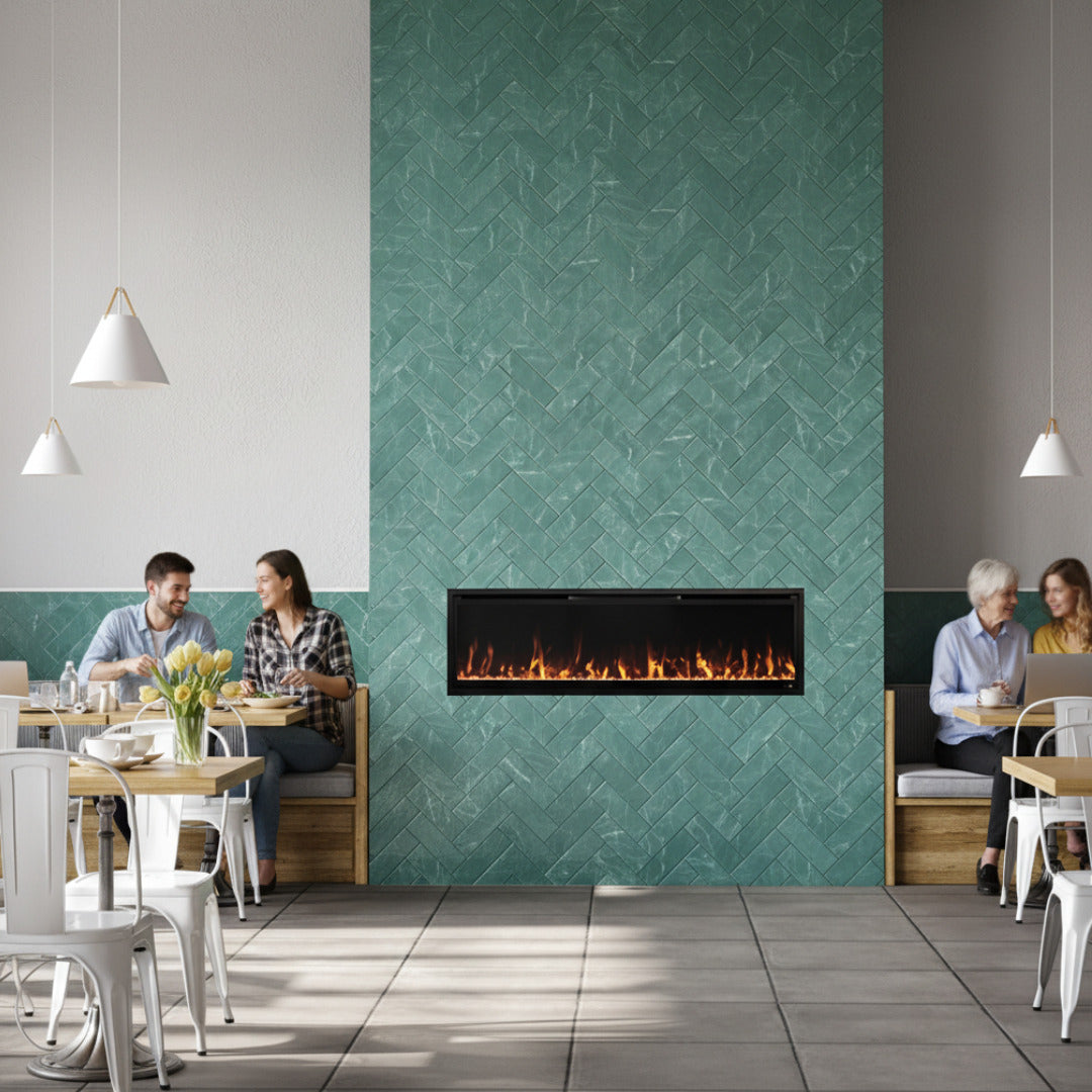 Linear electric fireplace that's the perfect width for the blue herringbone tile bump out it has been place in.
