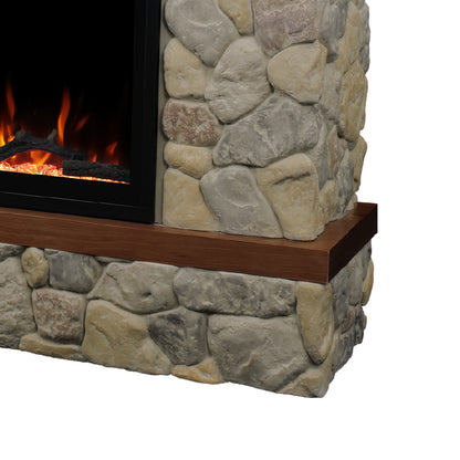Detail shot of the Brookstone River Rock Mantel corner, showcasing natural stone craftsmanship and rustic appeal.