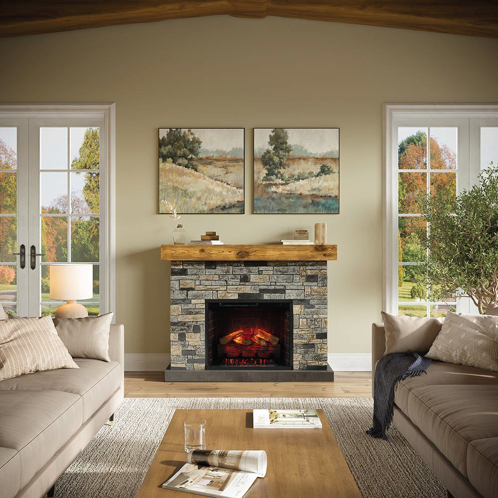 Wide view of a living room with the Dixson Stone Fireplace serving as a large, farmhouse-inspired focal point.