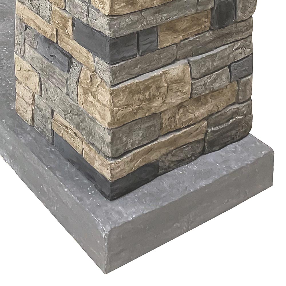 Angled perspective of the Dixson Stone Mantel showcasing the full faux stone  surround.