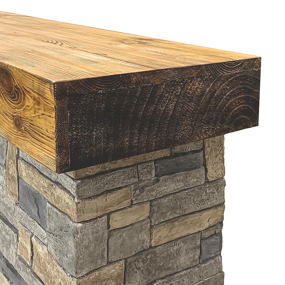 Close-up of the real wood mantel shelf with oak finish, showing the wood grain detail.
