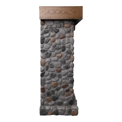 Close-up of the cast stone river rock detailing and the side profile of the mantel, showing the decorative corbel detail.