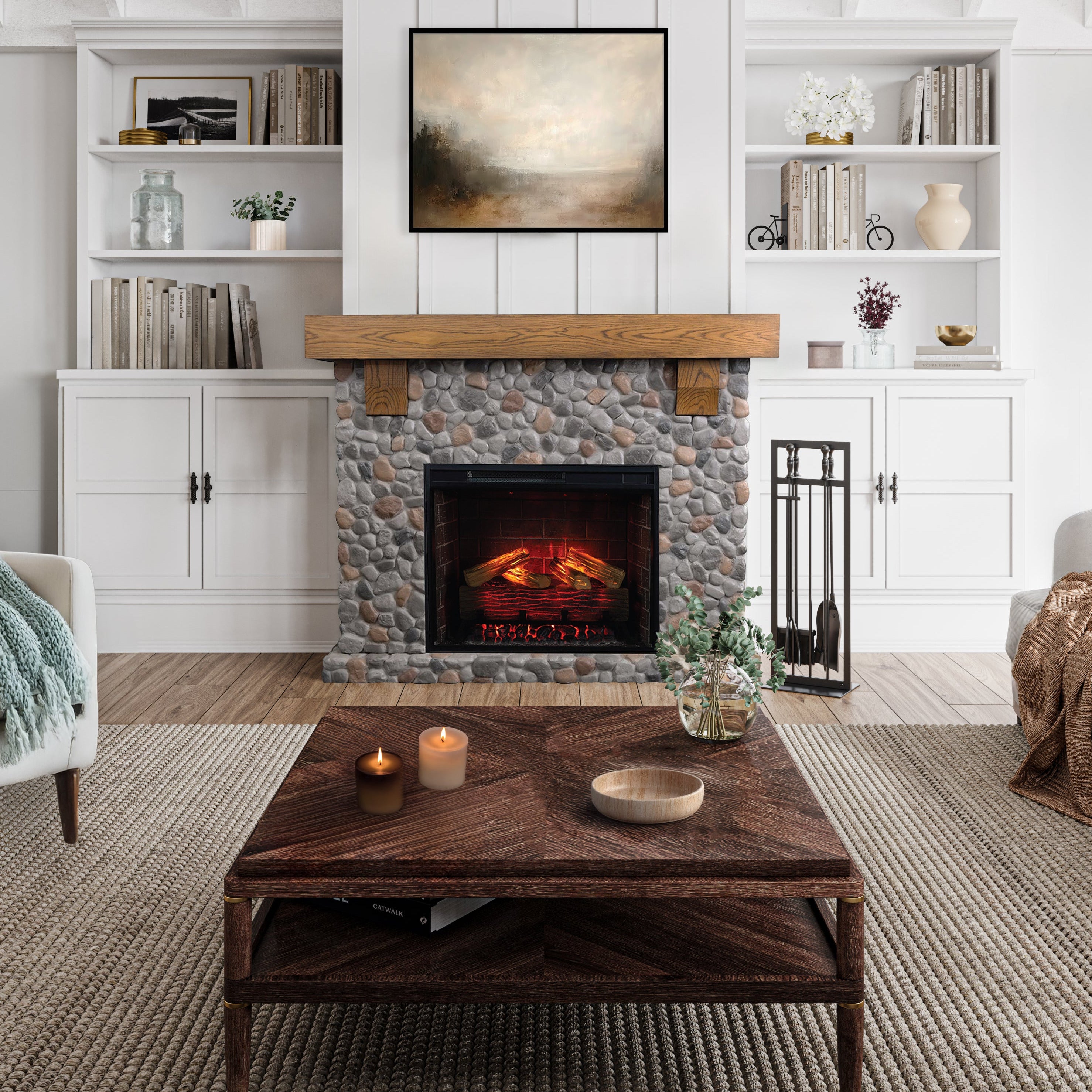 Glenbrook River Rock Mantel with a white oak shelf and cast stone river rock surround, featuring a 28" smart electric firebox insert. Rustic farmhouse living room decor.