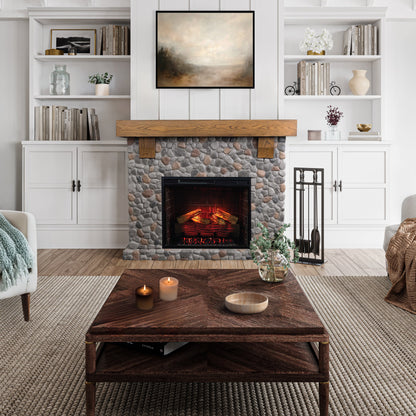 Glenbrook River Rock Mantel with a white oak shelf and cast stone river rock surround, featuring a 28" smart electric firebox insert. Rustic farmhouse living room decor.
