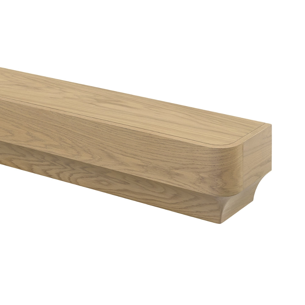 Angled view of the Forma floating shelf, light wood, highlighting the thickness and rounded profile.