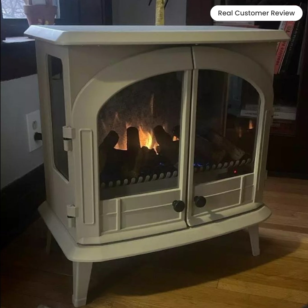 customer image of angled perspective of the white Harlowe Freestanding Electric Stove, emphasizing its compact 26-inch size and metal construction.