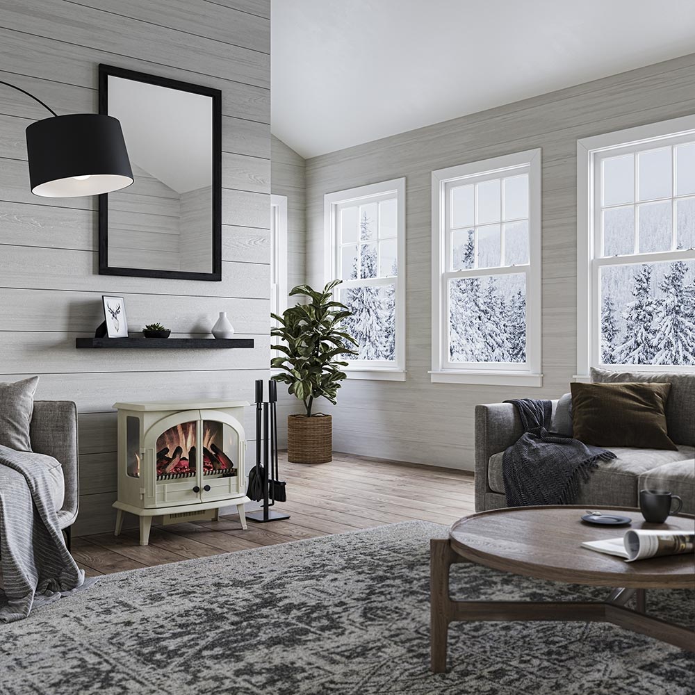 Stylized interior shot of the Harlowe Freestanding Stove near modern art, showcasing its versatile classic style in a contemporary setting.