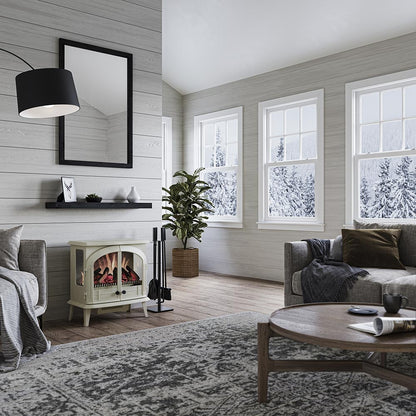 Stylized interior shot of the Harlowe Freestanding Stove near modern art, showcasing its versatile classic style in a contemporary setting.