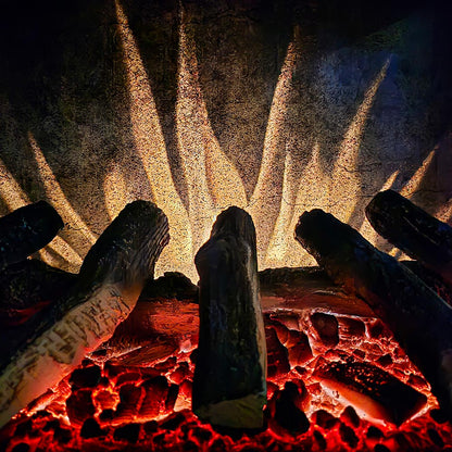 Extreme close-up of the Harlowe stove's custom flame effects, showing bright orange and yellow flames over the realistic log set.