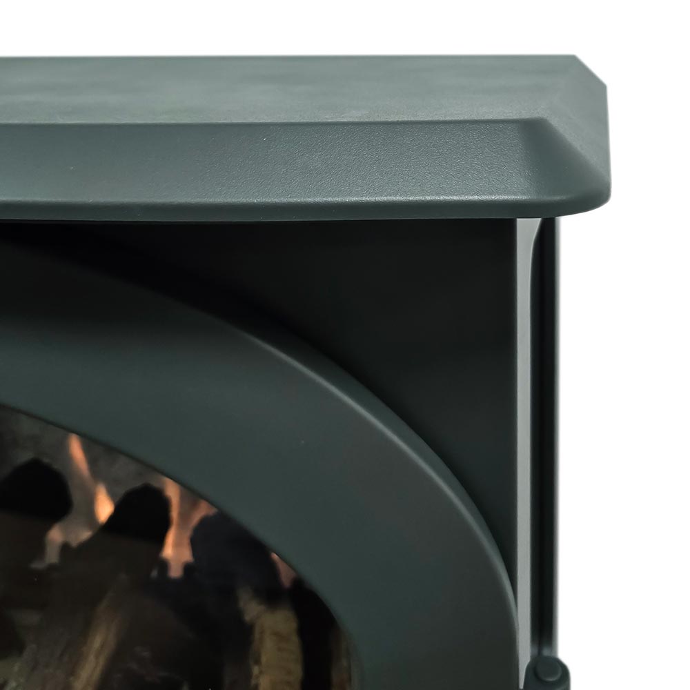 Close-up of the Harlowe electric stove top, showing the dark green metal finish and integrated heat vent.