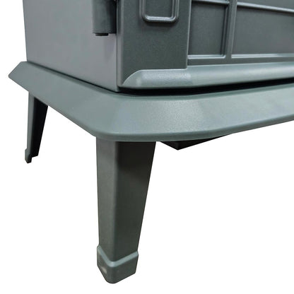 Close-up of the flared, hunter green metal legs of the Harlowe Freestanding Electric Stove, highlighting the traditional design.