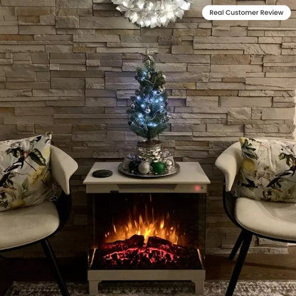 Taupe Skyline Freestanding Stove placed in customers sitting room with Christmas decor on top. 