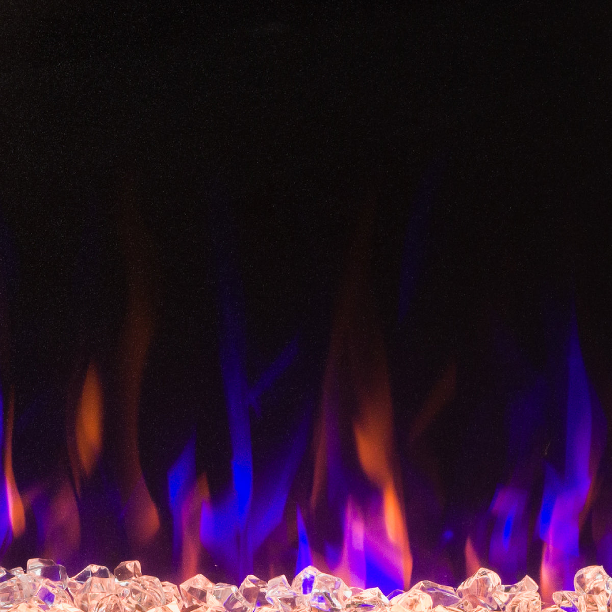 Full view of the Aerus Slim Linear Electric Fireplace with vibrant blue and purple flames and multi-colored ember lighting for a dramatic effect.