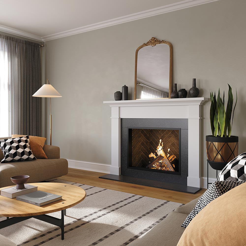 Angled version of Arden 48x41 Wood Mantel in white painted finish, framing a herringbone firebox with a burning wood fire, styled with modern ceramic vases and a wall mirror for a transitional living room design.