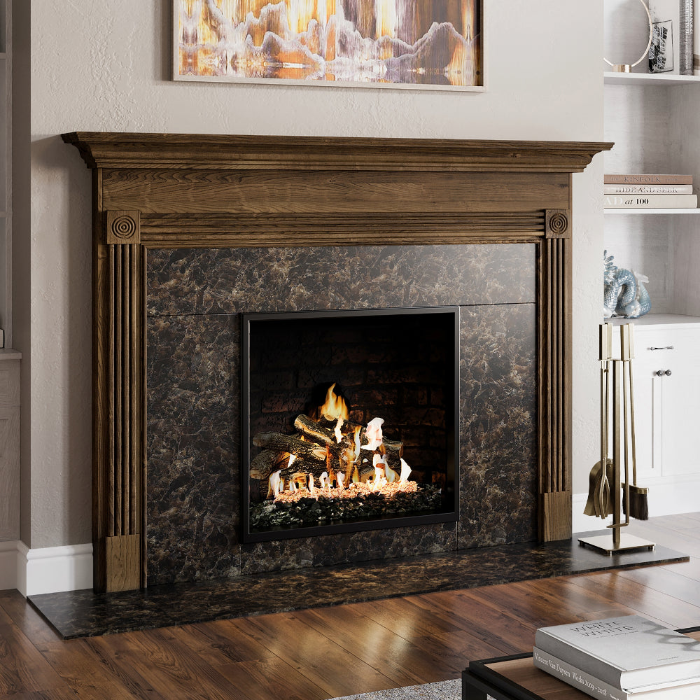 Harriet Fireplace Tool Set in Aged Brass next to fireplace. 