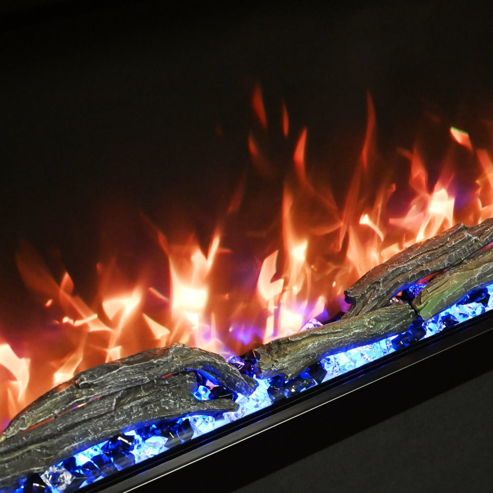 Close-up of the Highmark fireplace's intense orange and yellow flames, demonstrating the realistic, ultra-wide flame display.