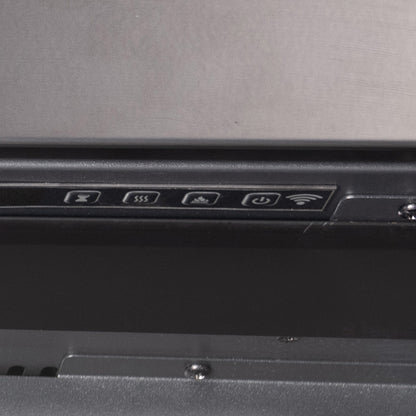 Close-up of the top edge of the Highmark Traditional Fireplace insert, showing the internal vent and simple trim.