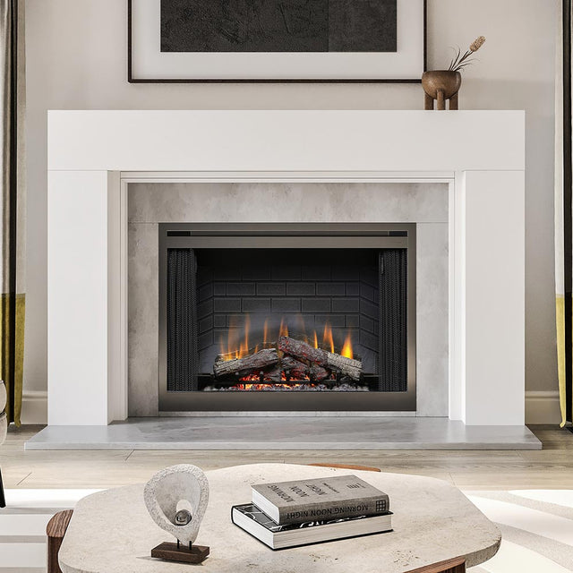 Sabine Wood Mantel - mantel surround in painted white paint finish framing gray firebox with glowing flames, styled in transitional living room
