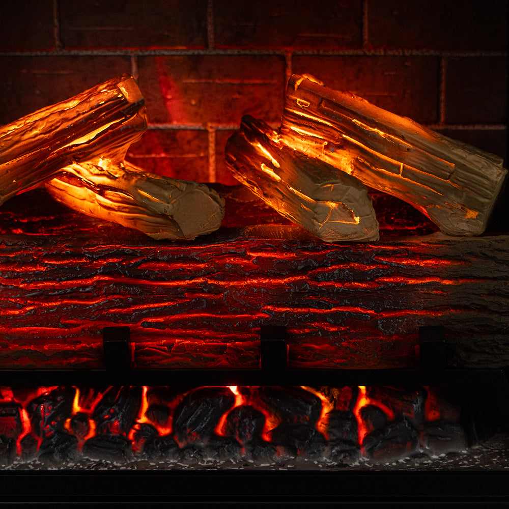 Close-up of the glowing resin hand-painted log set and ember bed inside the Uptown Insert.