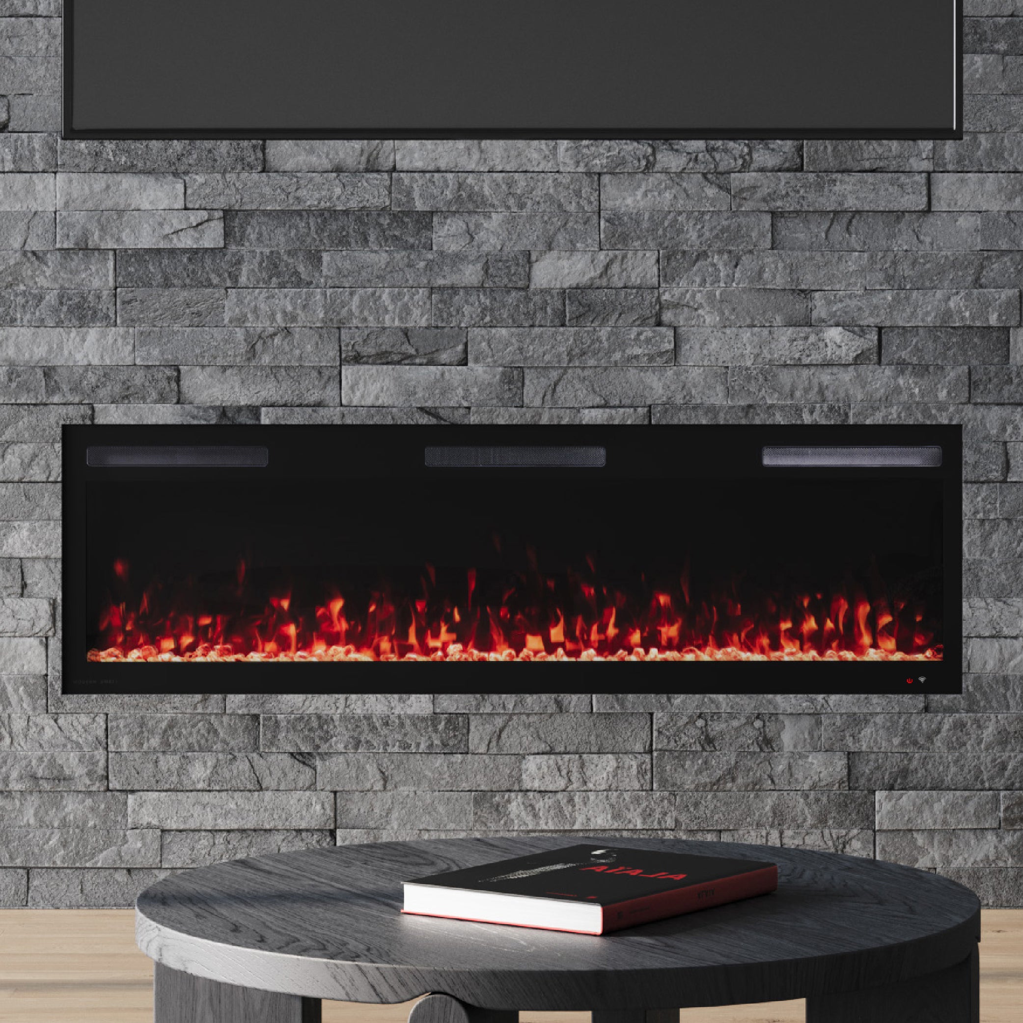 Vibrance Linear 60" Electric Fireplace with a sleek frameless build, recessed into a stacked stone wall with bright orange flames.