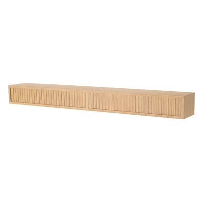 Angled view of the Blonde Monti Boxframe floating shelf, with clear fluted detailing for a dramatic modern look.