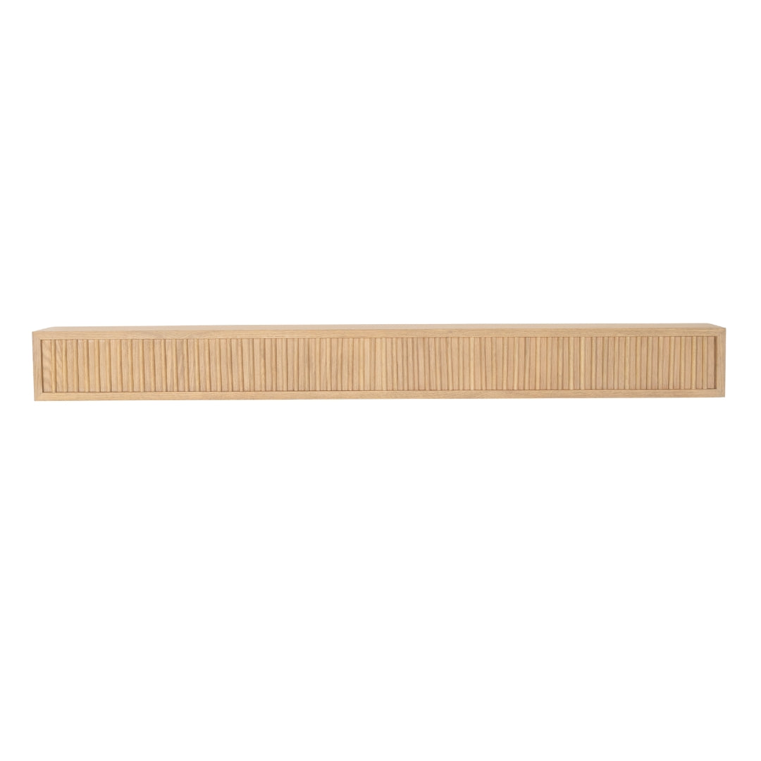 Profile view of the Monti Boxframe fluted wood shelf in a light natural finish.