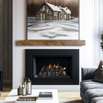 Modern Ember Tipton 72"  floating wood mantel shelf in natural finish styled above black firebox in modern living room.