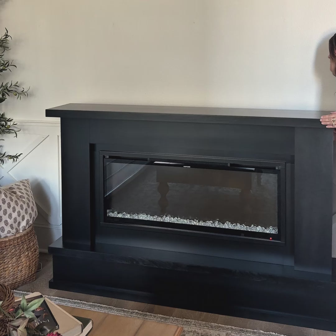 Patton Black Linear Mantel Package in a living space. 