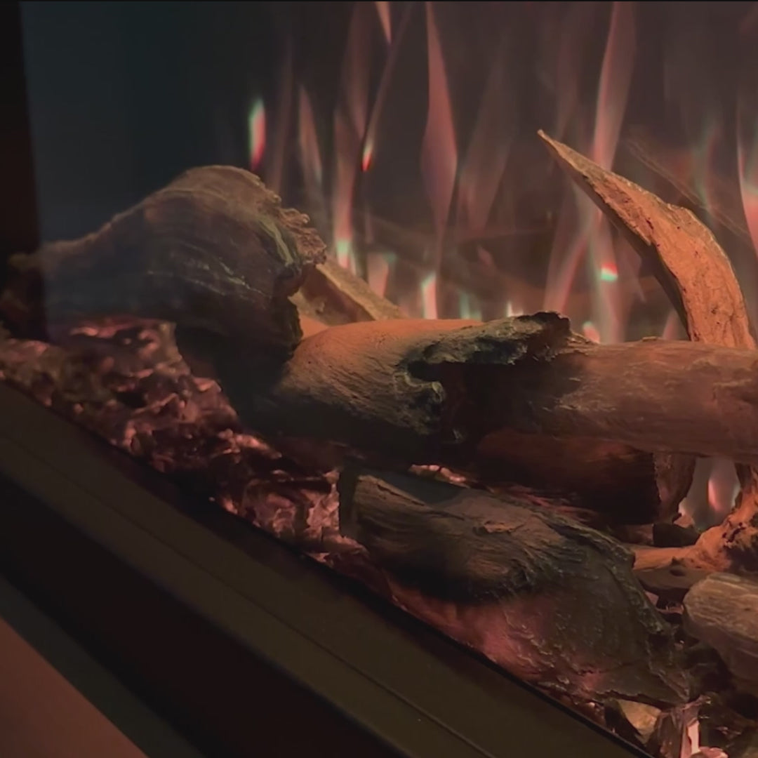 Load video: Video of Modern Ember realistic logs in electric fireplace. 